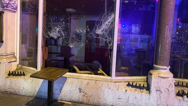Broken windows of a shop in Dublin city centre after violent scenes unfolded last night
